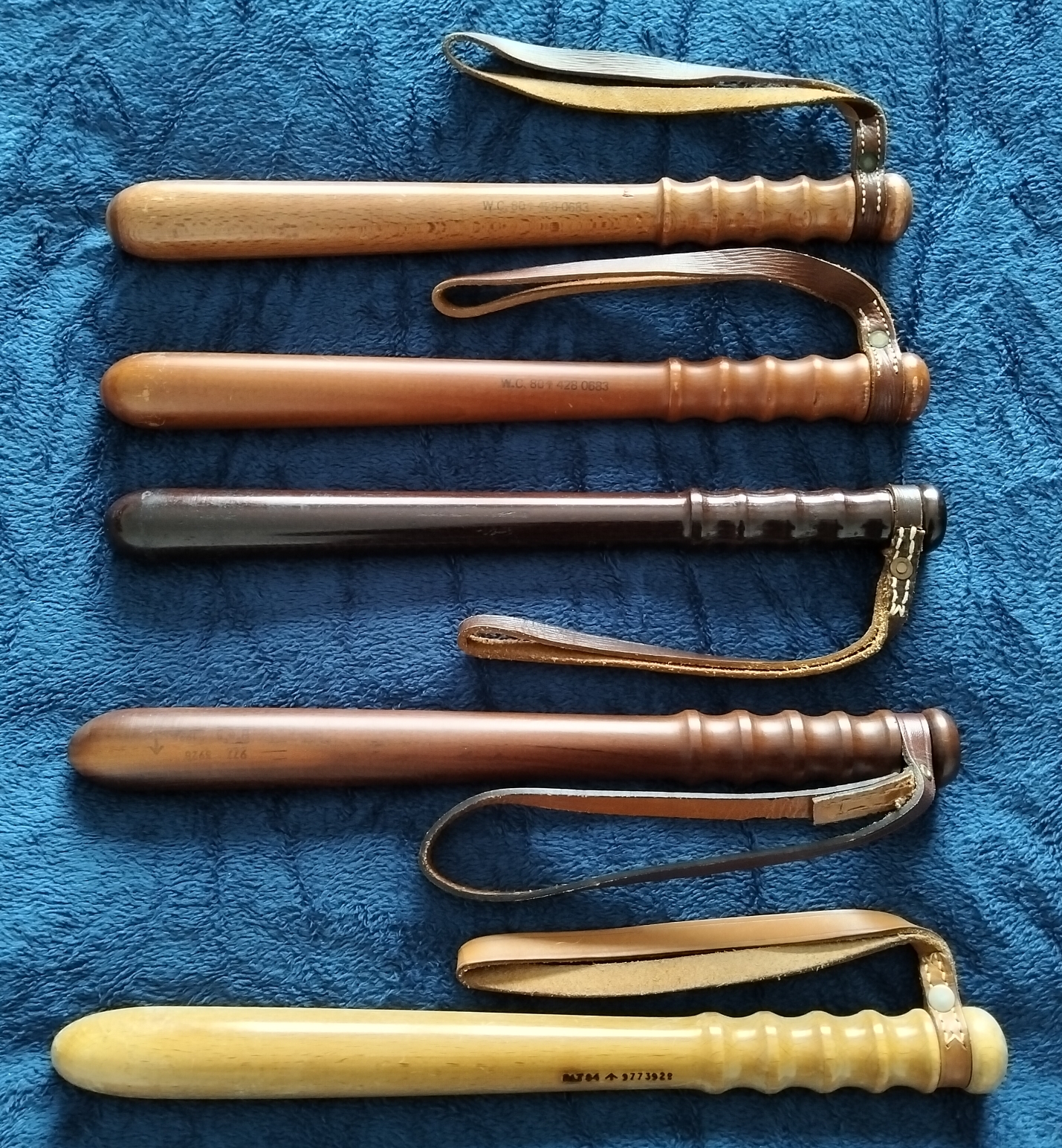 War Office wooden truncheons from different suppliers showing variation in material and finish